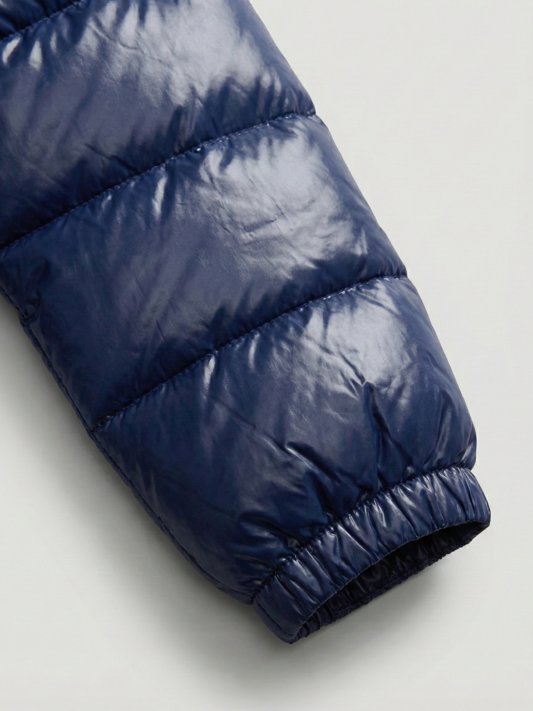 Copenhague | Doudoune à capuche brillante Bleu | FormaLuxe