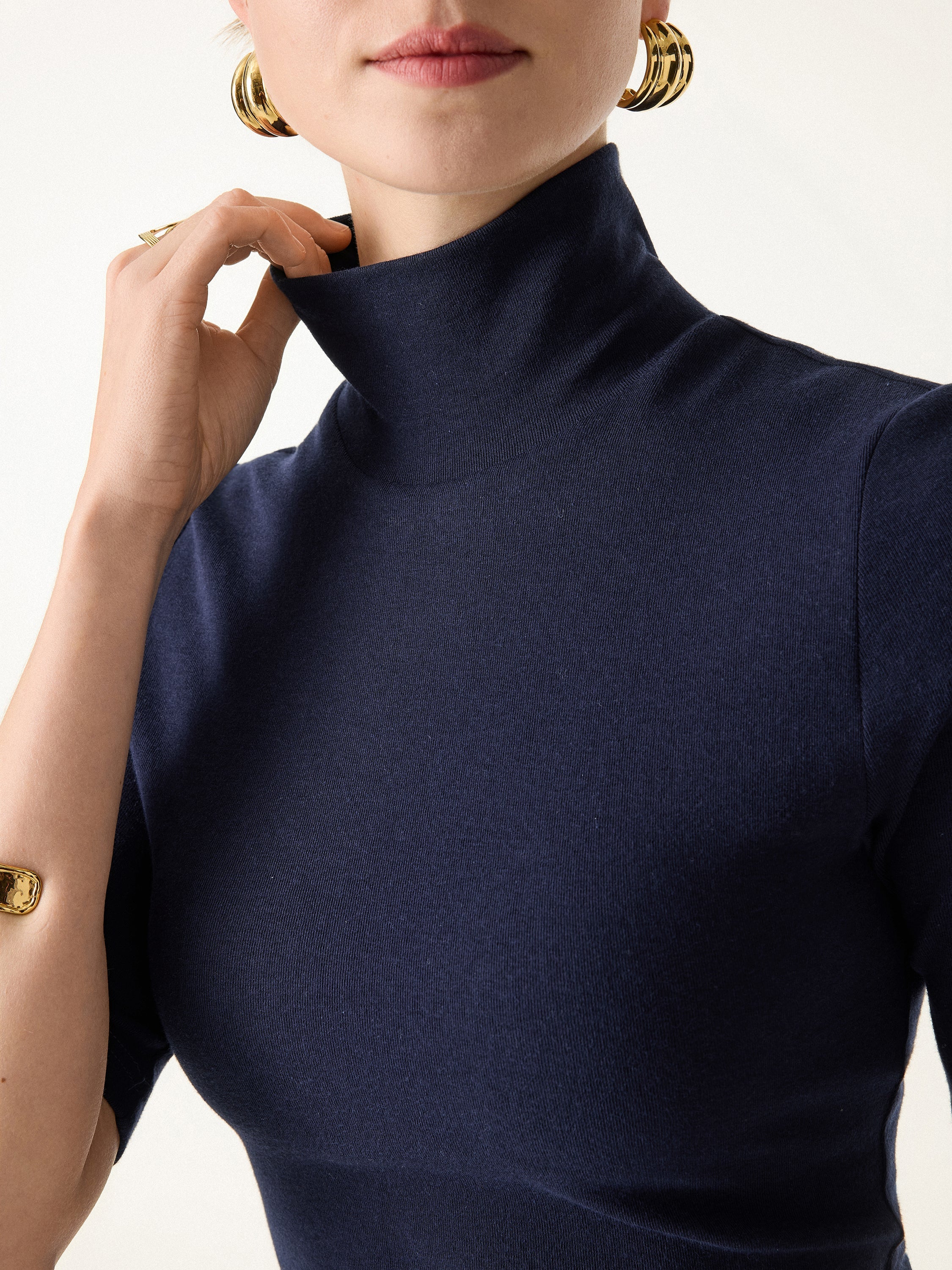 Essential Turtleneck Elbow Length Sleeve Brami Midnight Navy – Women > Tops > Bra Tops | FormaLuxe