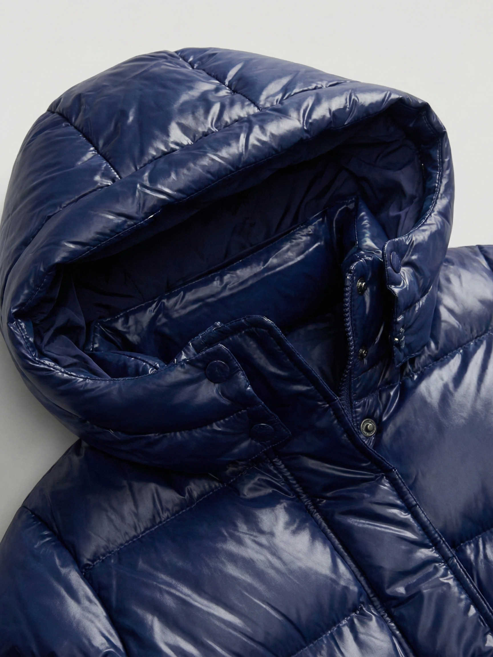 Copenhague | Doudoune à capuche brillante Bleu | FormaLuxe